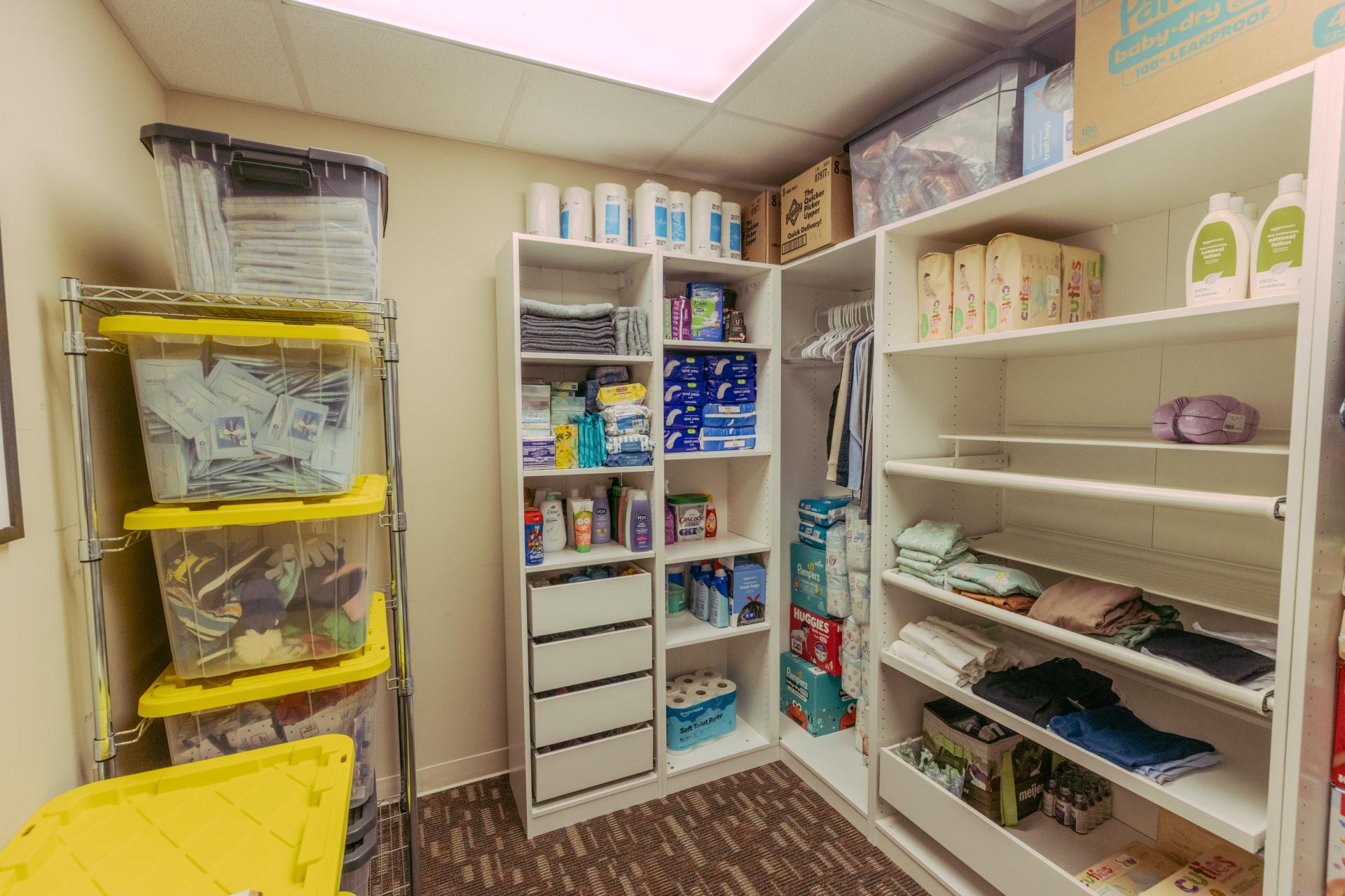 closet with shelves full of supplies for CAC families