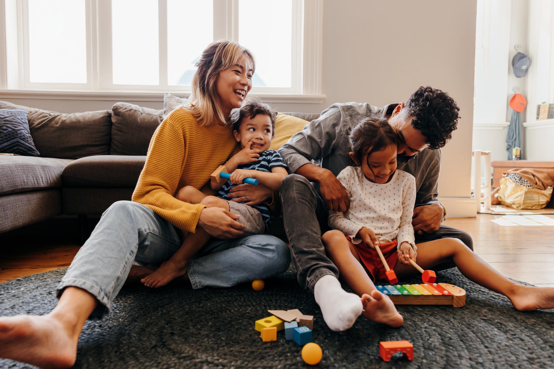 Family members playing with toys